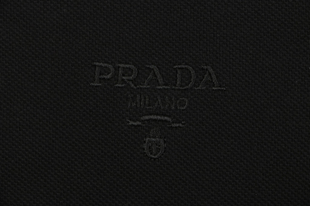 Prada Jacquard Medal Badge Contrast Collar Polo Shirt – Black