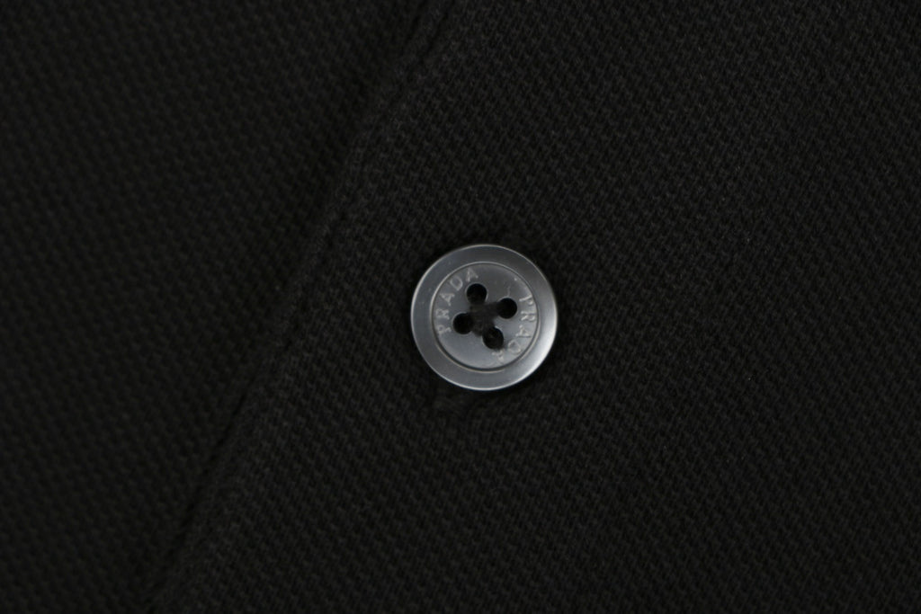 Prada Jacquard Medal Badge Contrast Collar Polo Shirt – Black
