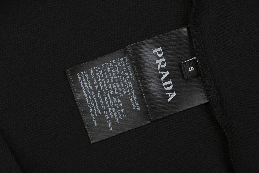 Prada Jacquard Medal Badge Contrast Collar Polo Shirt – Black