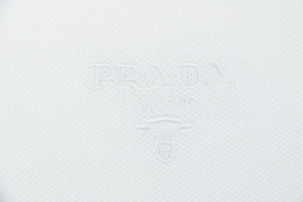 Prada Jacquard Medal Badge Contrast Collar Polo Shirt – White