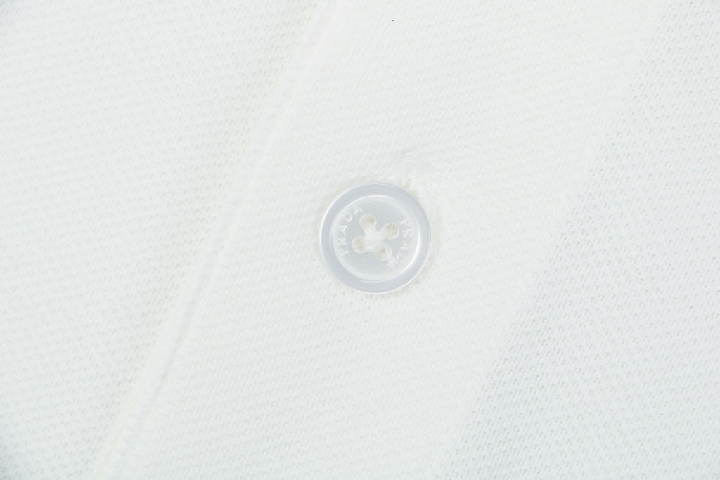 Prada Jacquard Medal Badge Contrast Collar Polo Shirt – White