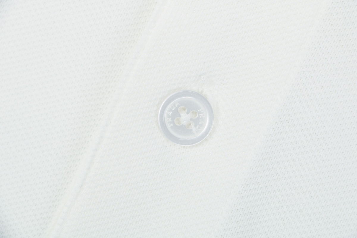 Prada Jacquard Medal Badge Contrast Collar Polo Shirt – White
