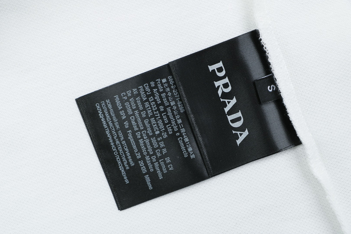 Prada Jacquard Medal Badge Contrast Collar Polo Shirt – White